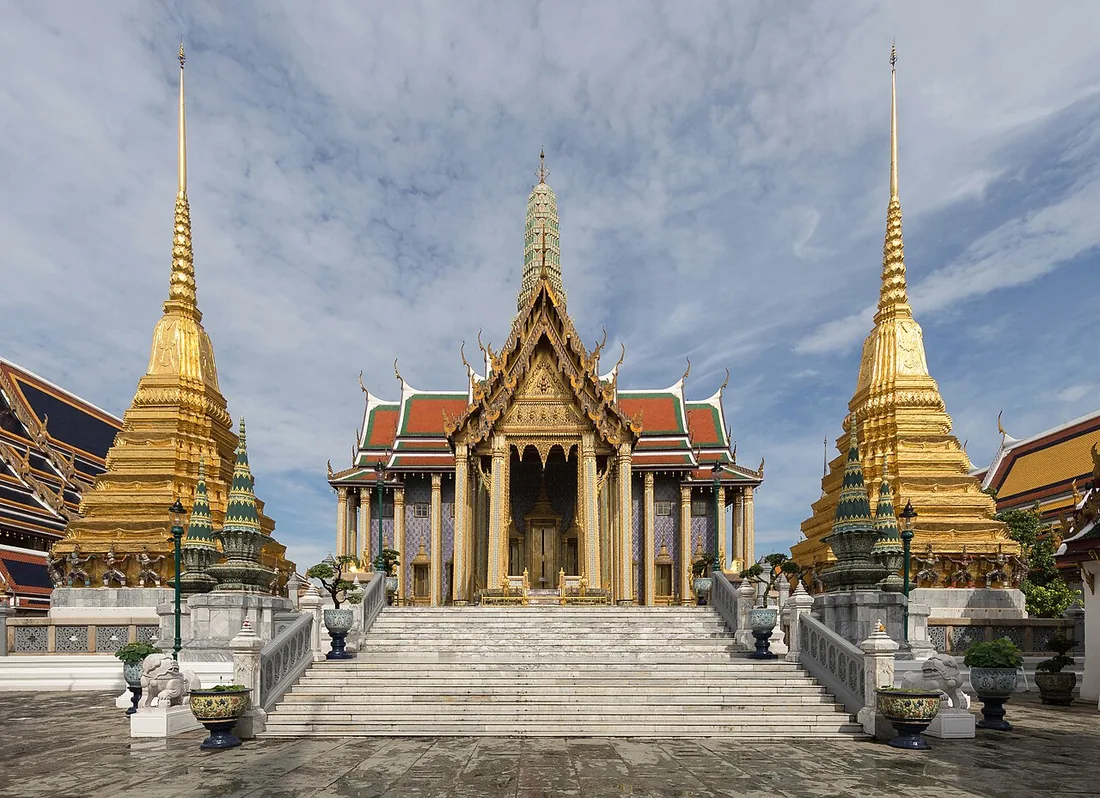 Prasat Phra Thep Bidorn and two golden chedis at Wat Phra Kaew inside Bangkok’s Grand Palace complex.